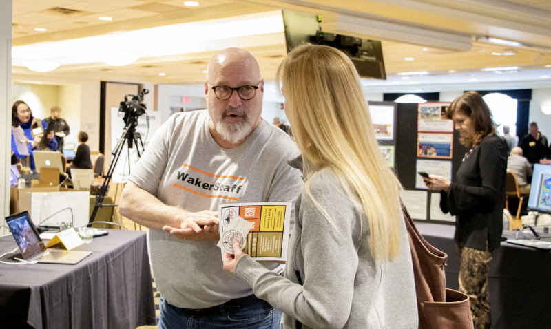 Paul Whitener talking to attendee at TechX 2020
