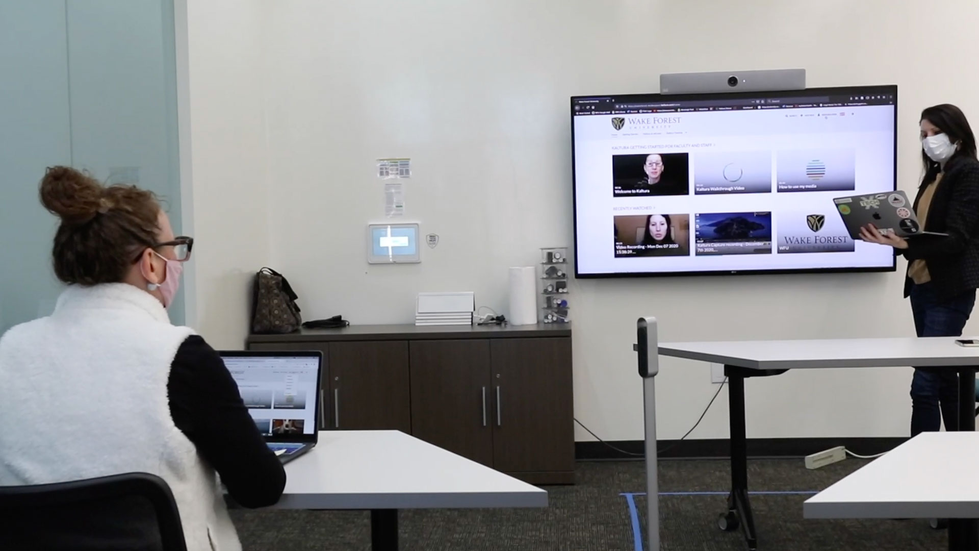 staff member attends a training session with Brianna Derr, Kaltura instructor with Academic Technologies