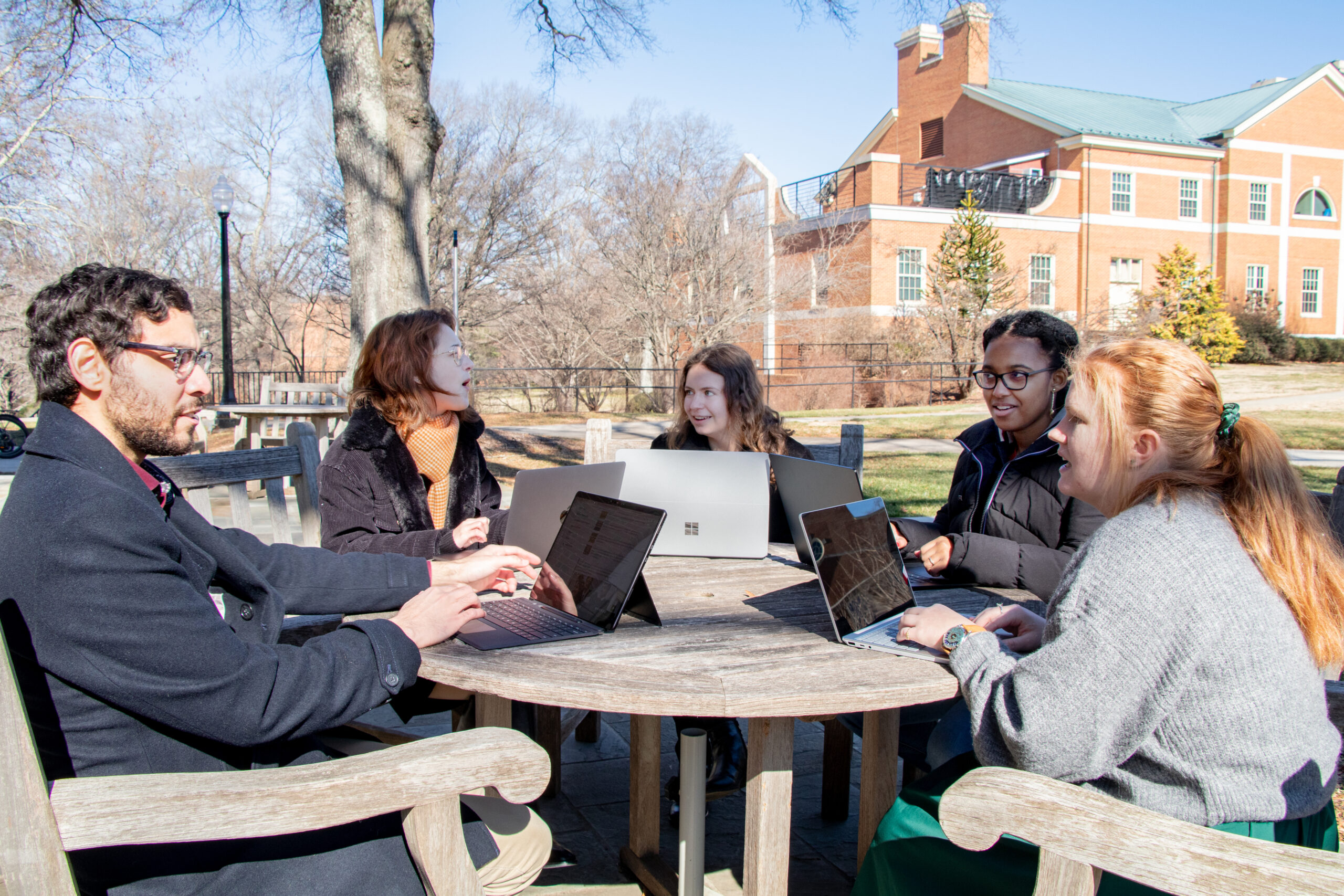 students outside on their computers
