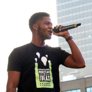 Donovan Livingston holding mic